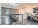 The upper level features bike, railing, and a skylight that floods the area with natural light at 801 Confidence Dr # 16, Longmont, CO 80504