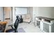 Office with a whiteboard, comfortable furniture, and a built-in kennel at 695 Simmental Loop, Castle Rock, CO 80104