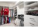Custom closet with shelving and rods for organized storage of clothes, shoes, and accessories at 695 Simmental Loop, Castle Rock, CO 80104