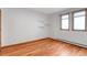 Bedroom featuring light hardwood floors and lots of natural light at 14440 Eagle Vista Dr, Littleton, CO 80127