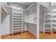 An open closet with shelves, a rod, and a mirror at 14440 Eagle Vista Dr, Littleton, CO 80127