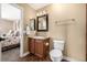 Clean bathroom with single sink vanity and toilet at 42280 Kingsmill Cir, Elizabeth, CO 80107