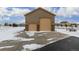 Large detached garage with double doors, offering ample storage space at 42280 Kingsmill Cir, Elizabeth, CO 80107