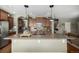 Open kitchen with an island and a breakfast nook at 42280 Kingsmill Cir, Elizabeth, CO 80107
