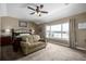 Large main bedroom with sitting area and scenic view at 42280 Kingsmill Cir, Elizabeth, CO 80107