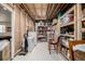 Finished basement storage room with shelving units and ample space for various items at 42280 Kingsmill Cir, Elizabeth, CO 80107