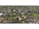 Aerial view of a peaceful neighborhood with mature trees, manicured lawns, and well-maintained homes at 248 Summit Trl, Broomfield, CO 80020