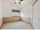 Cozy bedroom with neutral paint, plush carpet, and natural light through window at 248 Summit Trl, Broomfield, CO 80020