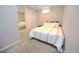Bedroom with carpet, mirror sliding door closet, and small window at 3111 W Bails Pl, Denver, CO 80219
