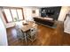 Comfortable living room with hardwood floors, modern furniture, and a cozy atmosphere at 3111 W Bails Pl, Denver, CO 80219