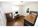 Functional office with hardwood floors, ample natural light, and a versatile layout at 3111 W Bails Pl, Denver, CO 80219