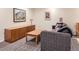 Relaxing living room boasts a modern sofa, decorative pillows, and contemporary artwork at 6379 S Jasmine Way, Centennial, CO 80111