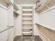 Spacious walk-in closet with built-in shelving and ample storage space at 6379 S Jasmine Way, Centennial, CO 80111