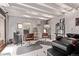 Salon/Barber shop setup in basement with white painted brick and exposed ceiling at 368 S Humboldt St, Denver, CO 80209