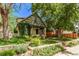 Inviting home exterior featuring manicured lawn, stone accents, and a charming front porch at 368 S Humboldt St, Denver, CO 80209