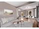 A brightly lit living room featuring hardwood floors and contemporary decor at 368 S Humboldt St, Denver, CO 80209