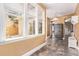 Bright sunroom with tile floors and large windows at 368 S Humboldt St, Denver, CO 80209