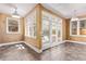 Sunroom featuring tile flooring, multiple windows, and natural light at 368 S Humboldt St, Denver, CO 80209