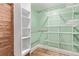 Walk-in closet featuring custom shelving and organization systems for optimal storage at 368 S Humboldt St, Denver, CO 80209