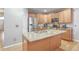 Well-equipped kitchen featuring granite countertops and ample cabinet space at 9011 Harlequin Cir, Longmont, CO 80504