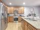 Modern kitchen with stainless steel appliances and an island at 9011 Harlequin Cir, Longmont, CO 80504