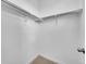 Interior view of closet with a built-in shelf and a carpeted floor at 2059 S Vance Way, Denver, CO 80227