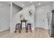 Dining area next to staircase perfect for gatherings at 2059 S Vance Way, Denver, CO 80227