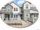 Charming townhome with gray siding, white accents, and inviting front porch area at 2059 S Vance Way, Denver, CO 80227