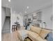 Open layout with a kitchen flowing into a welcoming living area, great for entertaining at 2059 S Vance Way, Denver, CO 80227