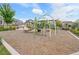 Community playground with swings and slides near modern townhomes at 2059 S Vance Way, Denver, CO 80227