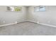 A bedroom with natural light and soft carpet at 6913 Teller Ct, Arvada, CO 80003