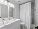 Modern bathroom featuring a double sink vanity and sleek fixtures at 23222 E Orchard Pl, Aurora, CO 80015