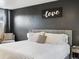 Inviting bedroom featuring a plush bed and comfortable seating at 23222 E Orchard Pl, Aurora, CO 80015