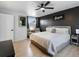 Cozy bedroom with dark accent wall and views at 23222 E Orchard Pl, Aurora, CO 80015