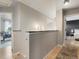 Upstairs hallway featuring hardwood floors and neutral paint at 23222 E Orchard Pl, Aurora, CO 80015