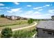 Manicured community grounds including a greenbelt, walking path and manicured lawns at 2592 S Norse Ct, Lakewood, CO 80228