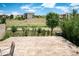 Spacious backyard with a concrete patio, perfect for outdoor enjoyment and entertaining at 2592 S Norse Ct, Lakewood, CO 80228