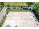 Aerial view of a stamped concrete patio and manicured lawn at 2592 S Norse Ct, Lakewood, CO 80228