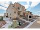 Charming multi-level home featuring a mix of brick and siding, landscaped front yard, and a welcoming entrance, perfect for families at 24501 E 41St Ave, Aurora, CO 80019