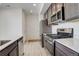 Bright kitchen features stainless steel appliances, gas range and an undermount sink at 24501 E 41St Ave, Aurora, CO 80019