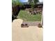 Inviting backyard featuring a patio, tiered garden and privacy fence at 4783 S Taft St, Morrison, CO 80465