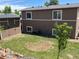 Spacious backyard with tiered garden and detached storage shed at 4783 S Taft St, Morrison, CO 80465