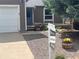 Charming home exterior with a well-maintained yard and a 'For Sale' sign at 4783 S Taft St, Morrison, CO 80465