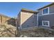 A utility shed in the back corner offers secure space in this fenced back yard at 4783 S Taft St, Morrison, CO 80465