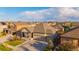 Desirable neighborhood showcasing well-maintained homes, lush landscaping, and curb appeal creating a sense of community at 19468 E 65Th Pl, Aurora, CO 80019