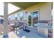 Outdoor patio with a gas grill and griddle perfect for entertaining and al fresco dining at 19468 E 65Th Pl, Aurora, CO 80019