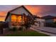 Charming single-Gathering home boasting a well-manicured lawn and a welcoming covered porch perfect for relaxation at 19468 E 65Th Pl, Aurora, CO 80019