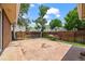 Backyard patio with a brick fence, landscaped garden and lawn perfect for outdoor relaxation at 37 E 14Th Pl, Broomfield, CO 80020