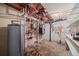 Unfinished basement with exposed pipes, water heater, and mechanical equipment, ready for customization at 37 E 14Th Pl, Broomfield, CO 80020