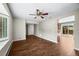 Dining room with warm wood floors that leads into an updated kitchen at 37 E 14Th Pl, Broomfield, CO 80020